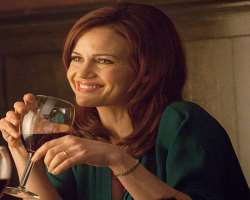 Carla Gugino consuming alcohol